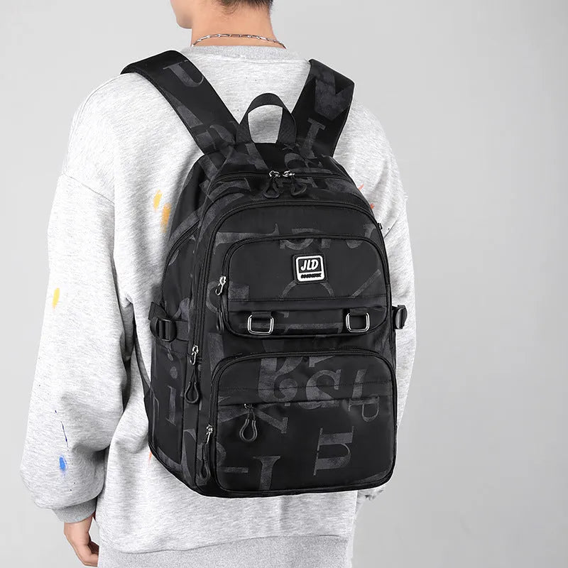 Large capacity nylon school backpack for girls with curved backplate, shown in a colour or print option.