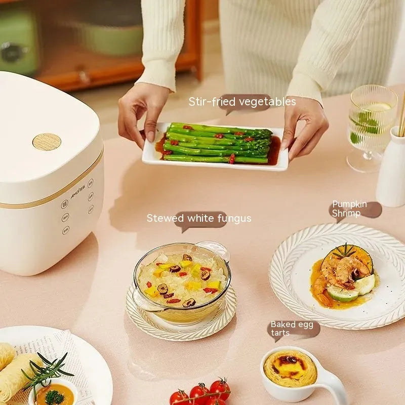White or beige 3-litre rice cooker with black inner pot and included accessories