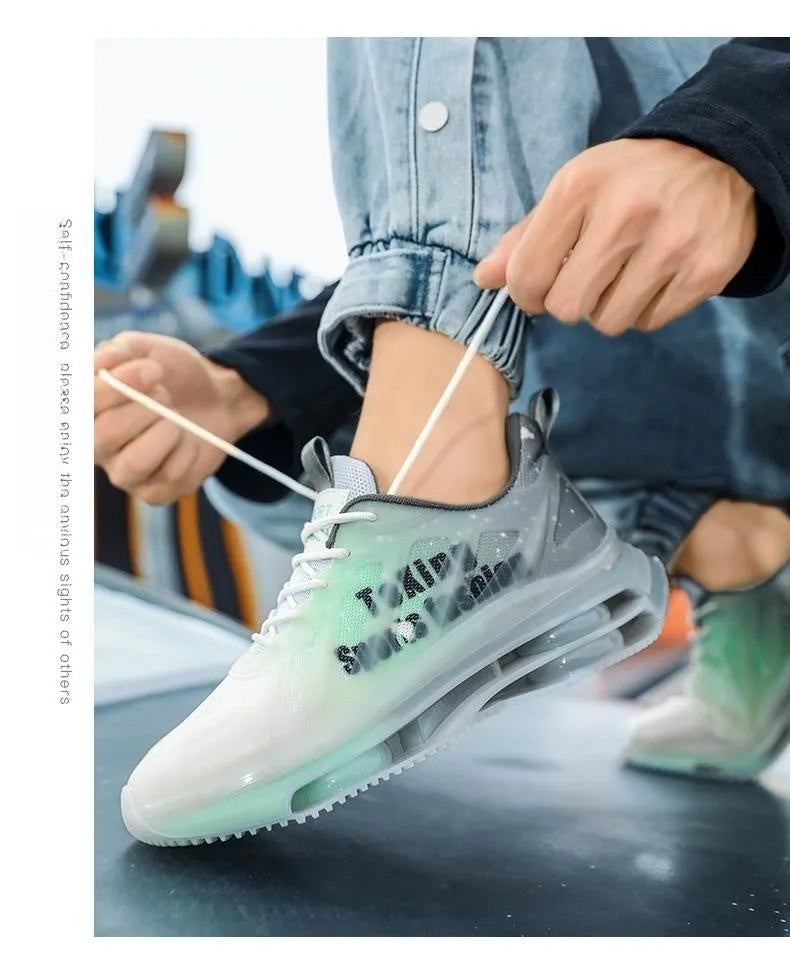 Men's black and green chunky sole platform trainers with mesh upper and lace-up design on a white background.
