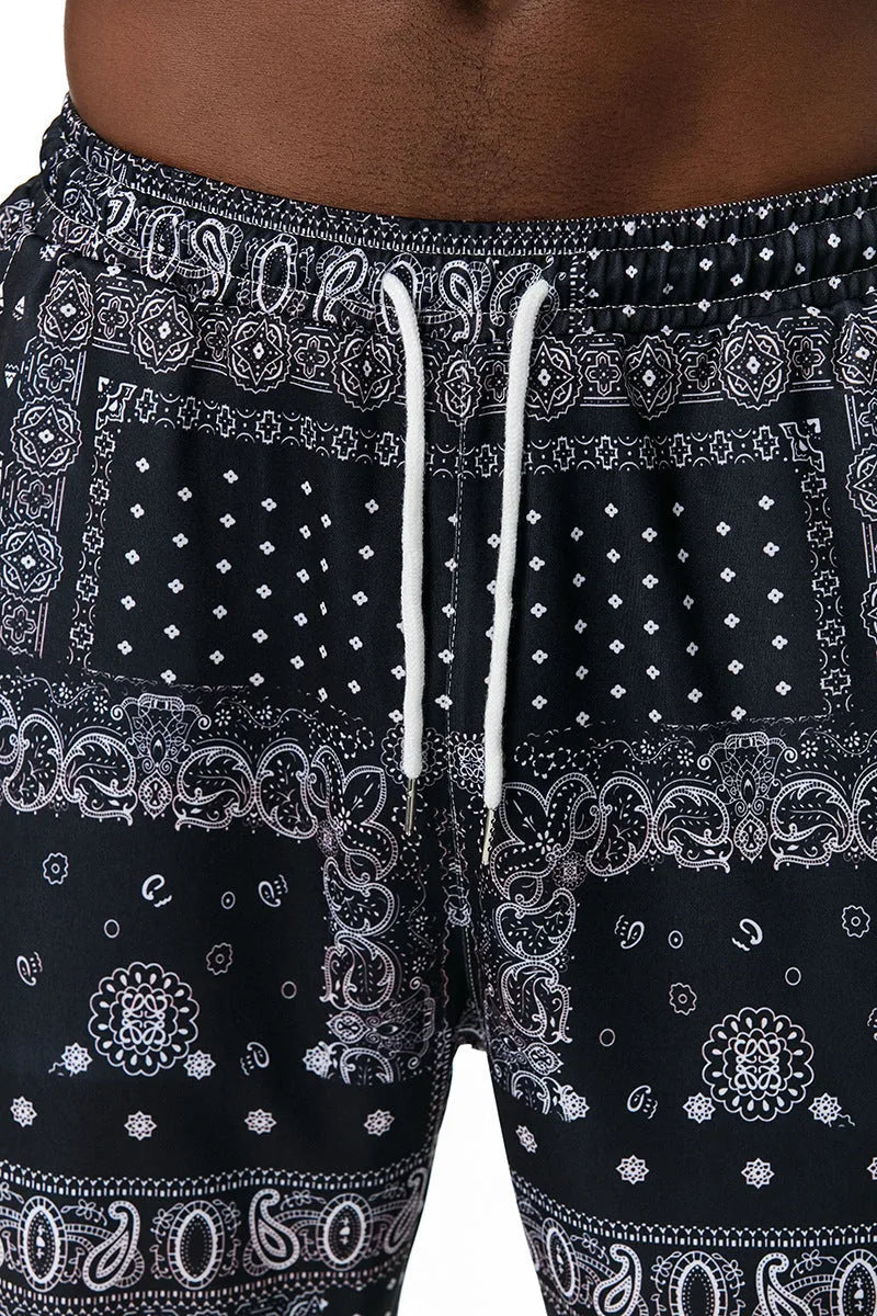 Ethnic printed slacks in Korean straight-leg style with mid-waist rise, no belt, available in sizes S to XXL