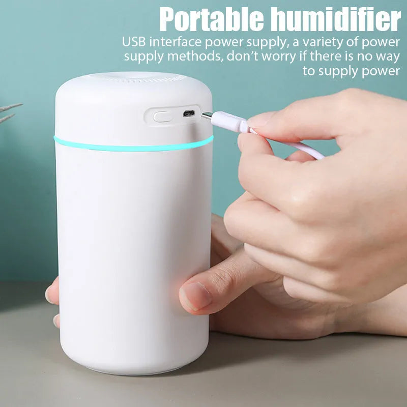 White columnar plastic desktop USB humidifier with single fog outlet for indoor use