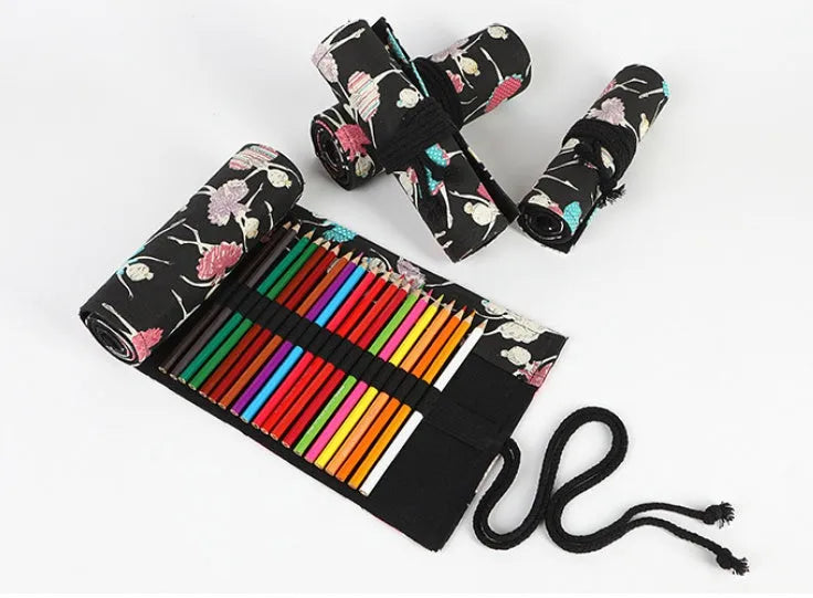Canvas rolling pencil case with ballet girl print, showing multiple hole capacity options for colour pencils.