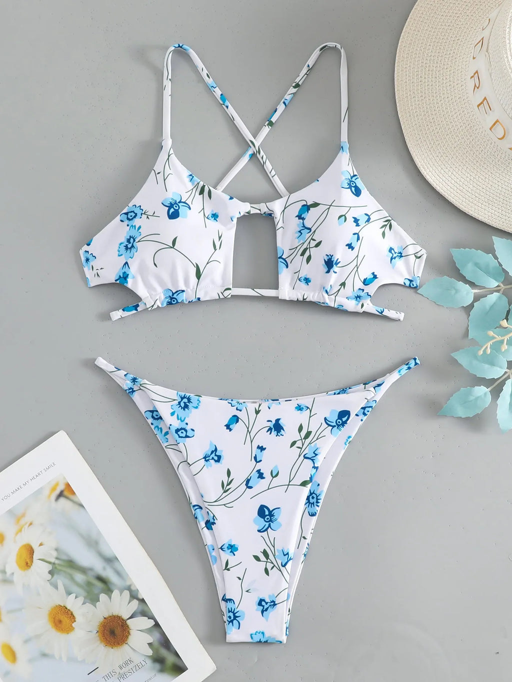 Women's floral swimsuit set with tie-neck triangle top and matching shorts