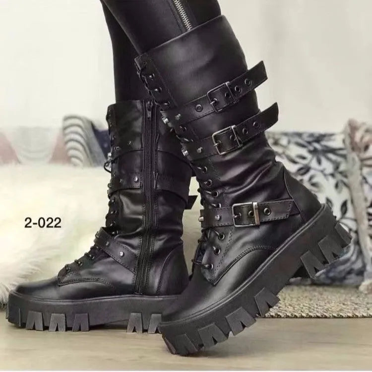 Black women's mid-calf boots with metal buckles and a side zipper on a white background.
