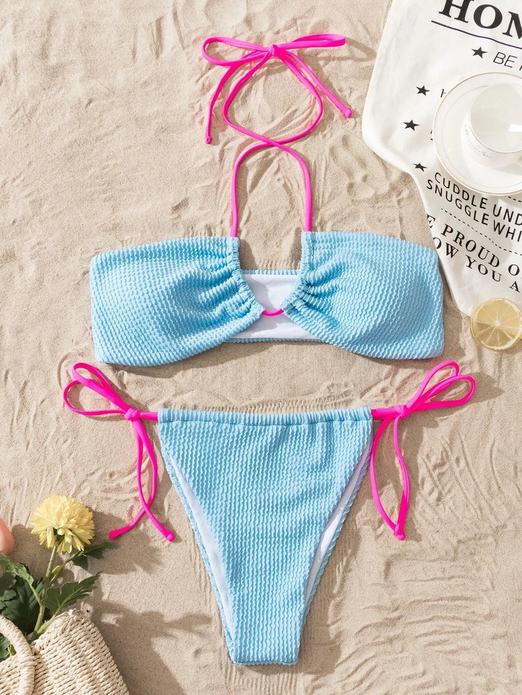 Women's solid colour halter lace-up swimsuit with brief bikini bottoms