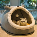 Light gray Totoro semi-closed pet bed with upgrade thickening for small cats placed indoors