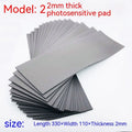 Black and grey plastic photosensitive mat for seal making in pottery and calligraphy.