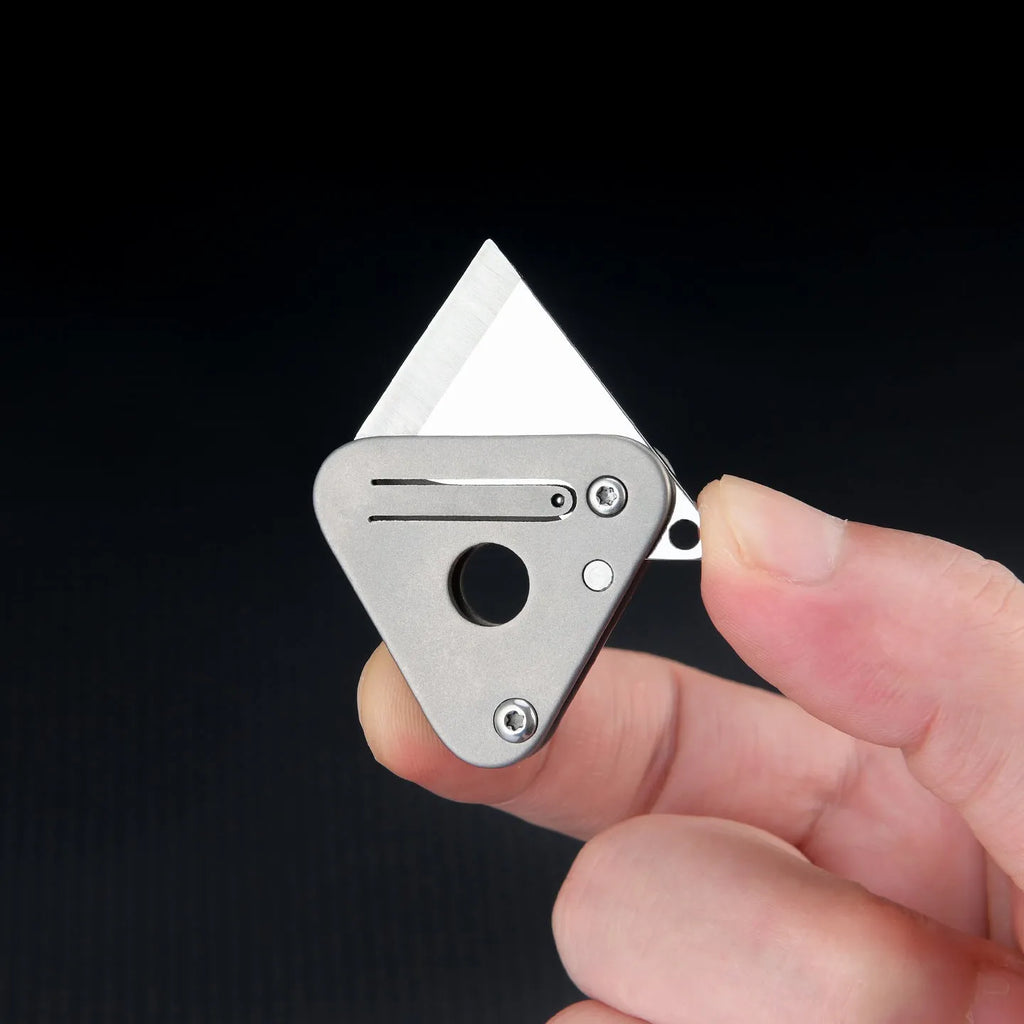 Triangle titanium alloy mini portable knife with stainless steel blade and button lock in silver gray