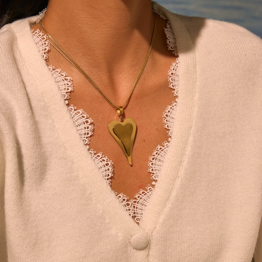 Stainless steel women's necklace with geometric double heart pendant on snake bones chain
