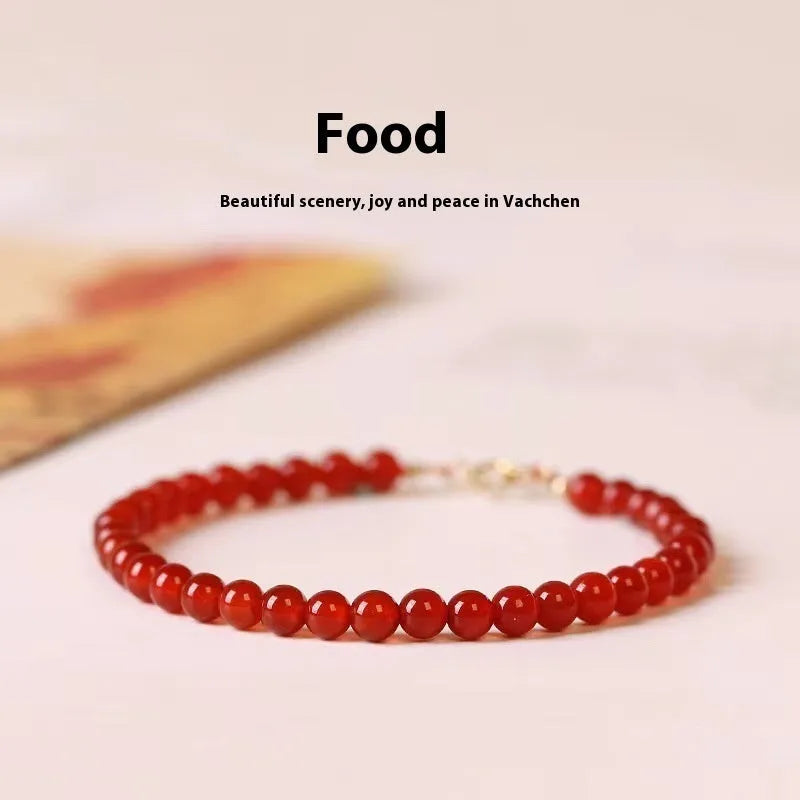 Ultra-thin classic red agate bracelet for women on a white background.
