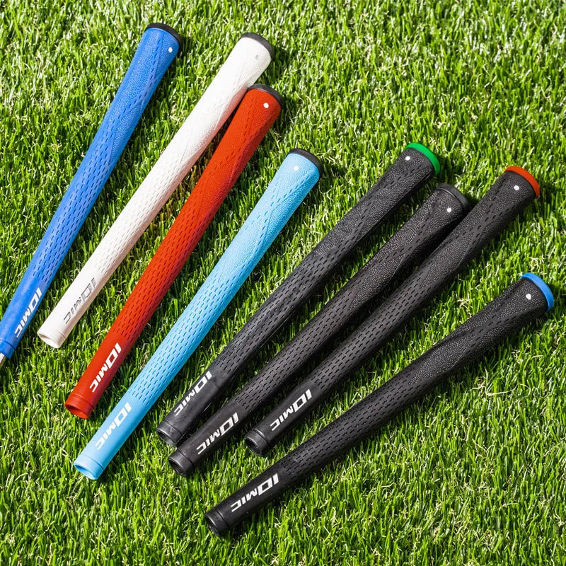 TPE golf club grip in assorted colours including pink, red, and black with blue head on a golf club.