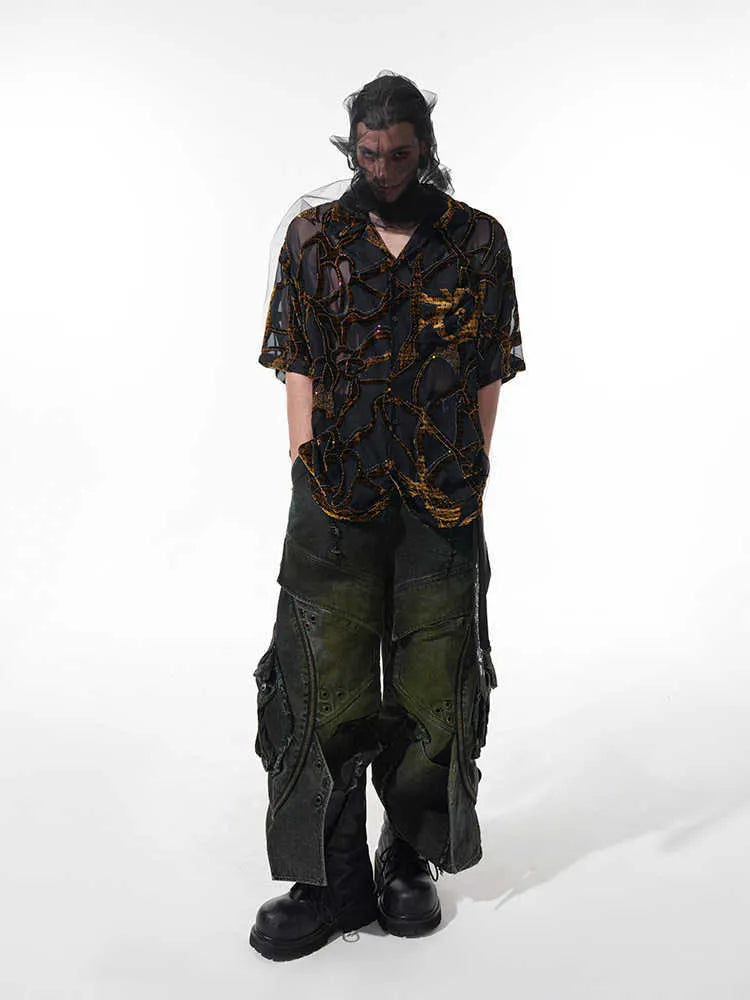 Man modelling a black and grey snake pattern translucent short-sleeved loose-fit shirt