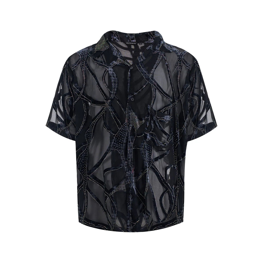 Man modelling a black and grey snake pattern translucent short-sleeved loose-fit shirt