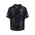 Man modelling a black and grey snake pattern translucent short-sleeved loose-fit shirt