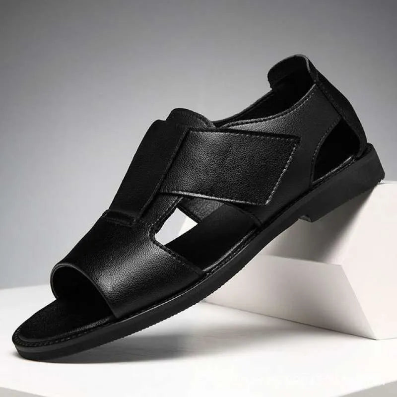 Men's black and brown leather open-toe sandals with a rubber sole on a neutral background.