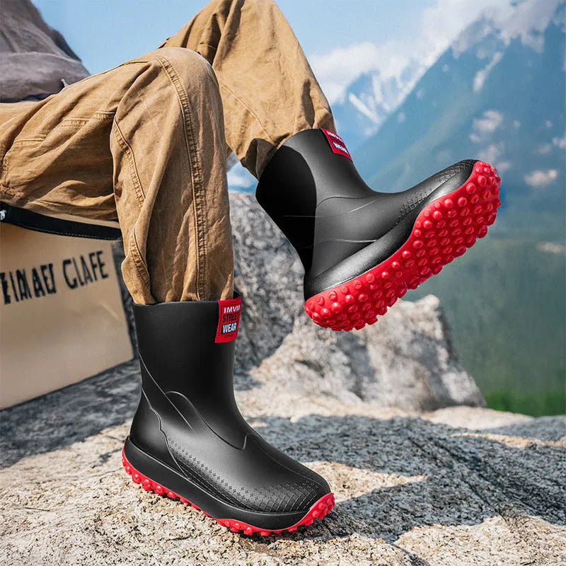 Men's PVC oversleeve rain boots in beige with a non-slip plastic sole.