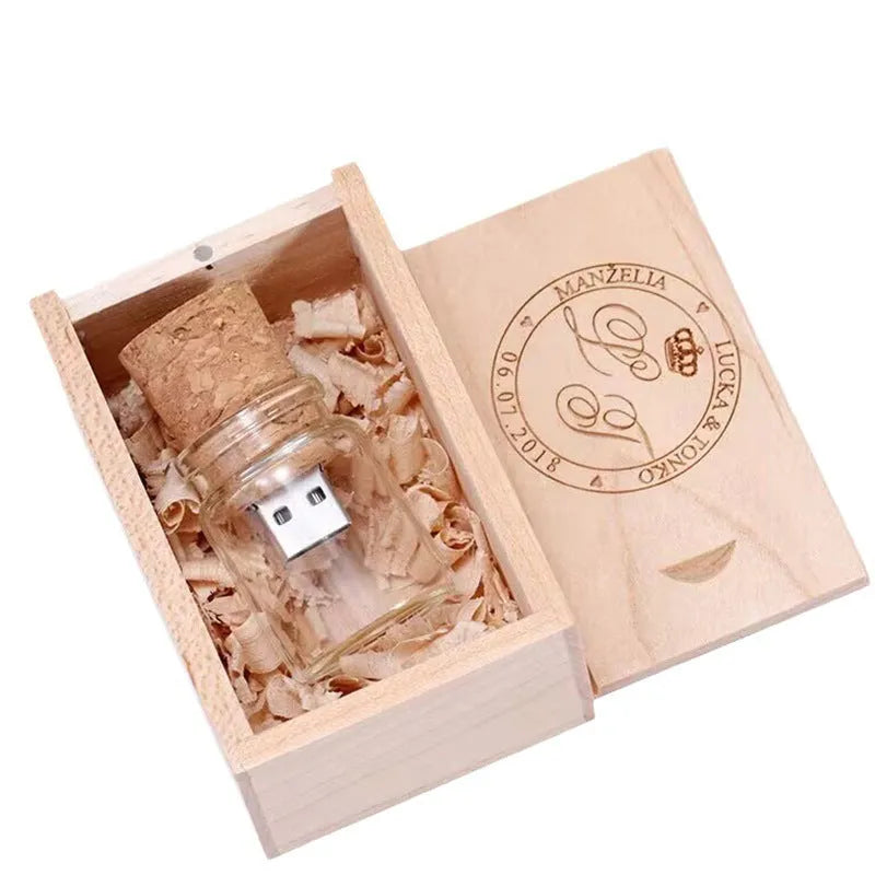Transparent bottle-shaped USB flash drive with a wooden charm inside, showing metal connector.
