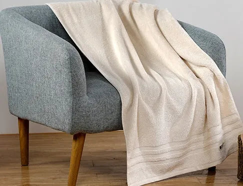 Cotton towels set showing bath, hand and guest towels in brown colour