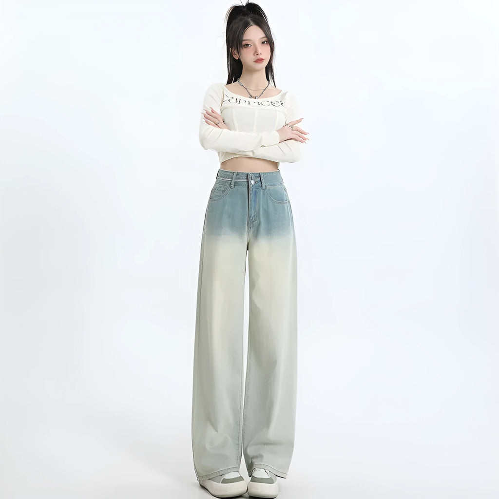 Women's wide-leg straight-cut denim trousers in a gradient blue colour wash.