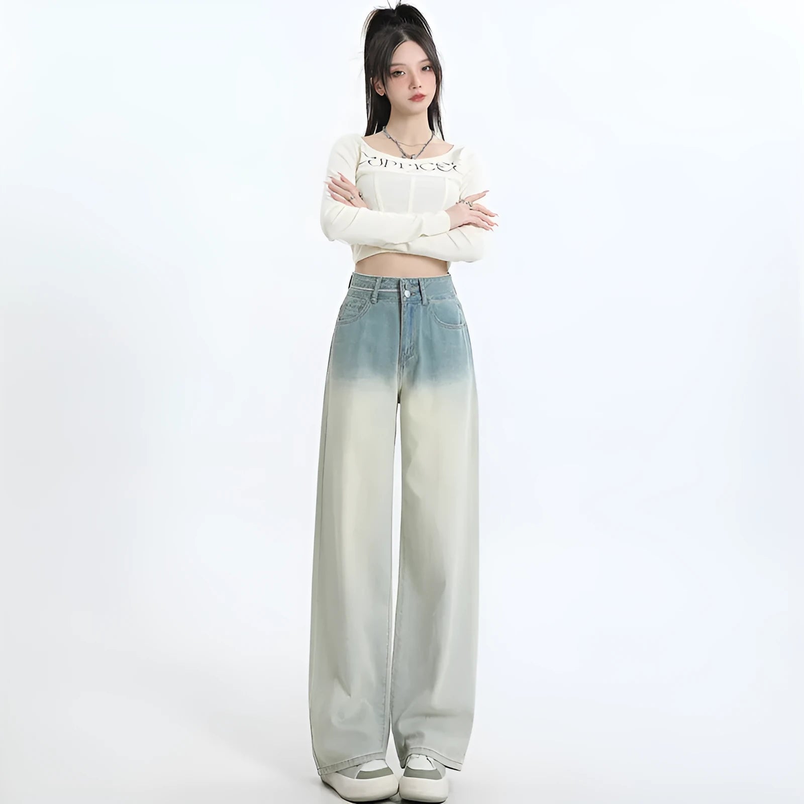 Women's wide-leg straight-cut denim trousers in a gradient blue colour wash.
