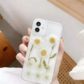 White epoxy daisy floral design TPU phone case for iPhone, showing back cover.