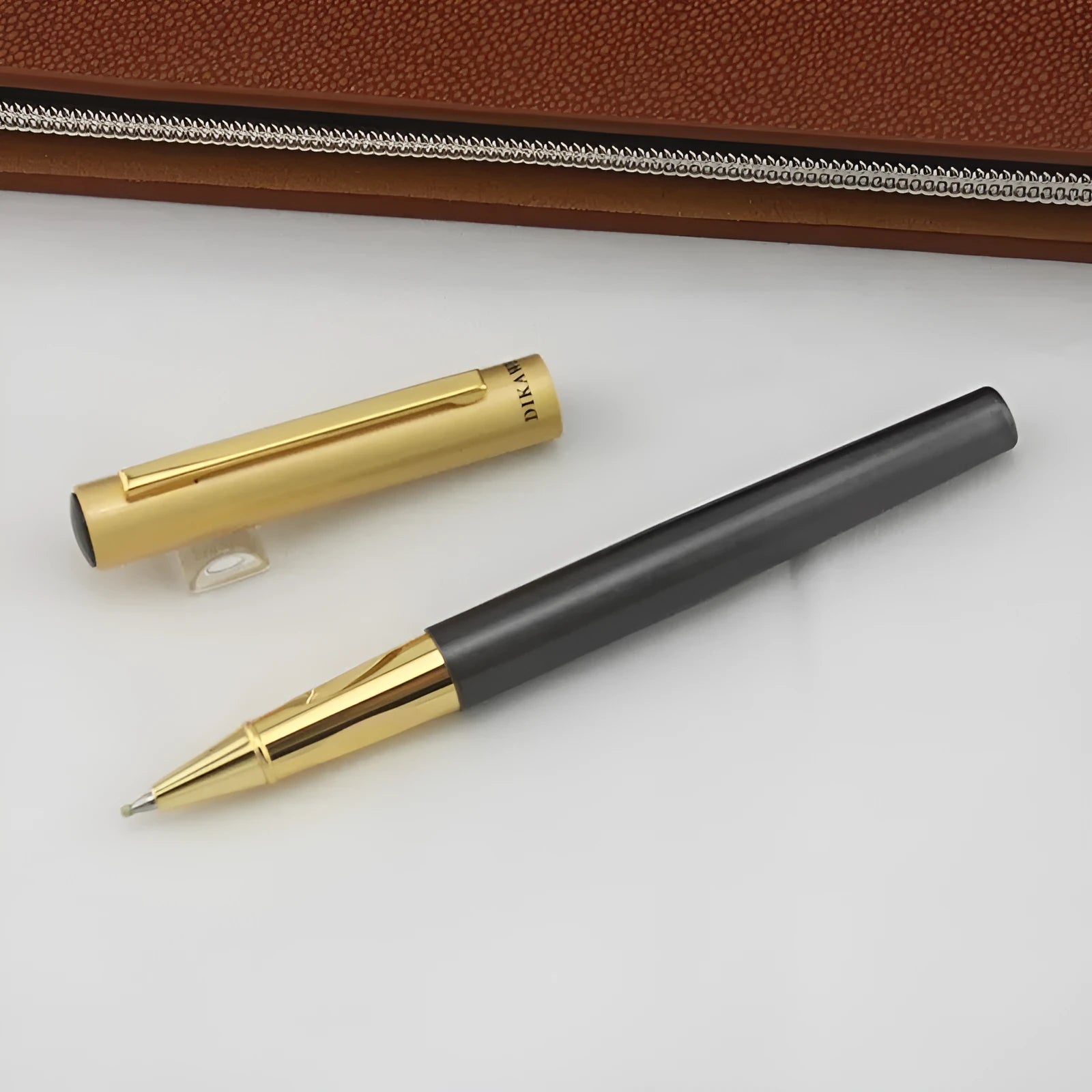 Metal baozhu ballpoint pen for students shown in seven colour options