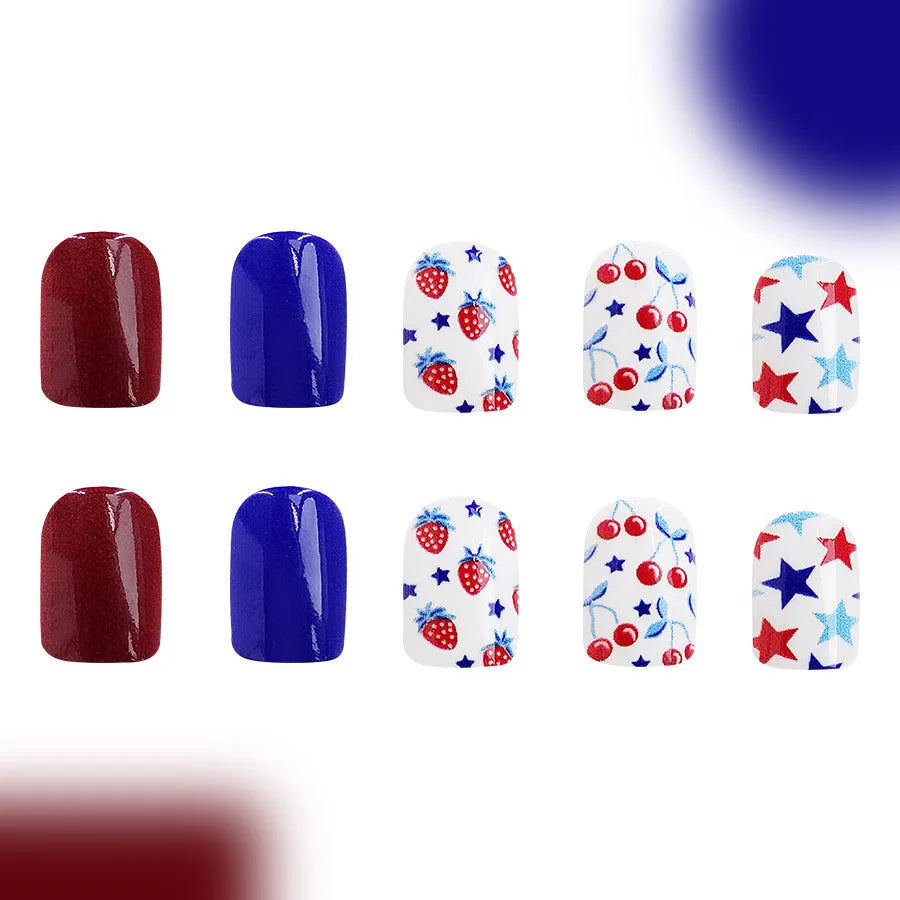 Short glossy red and blue strawberry cherry design nail stickers, 24 pieces.
