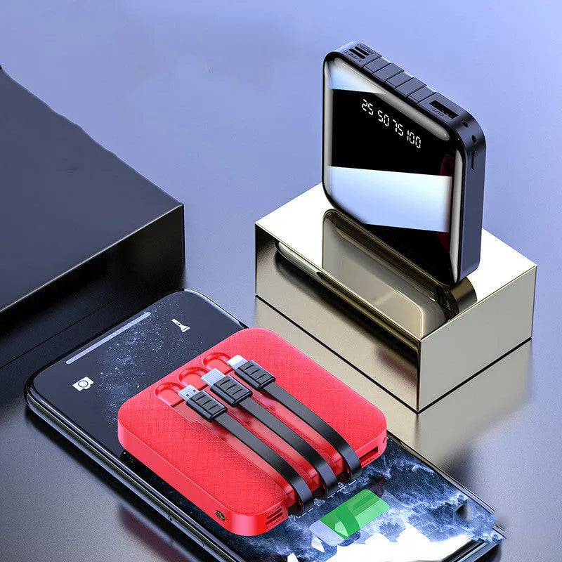 Square black power bank with a built-in USB charging cable, showing 10000mAh capacity label.