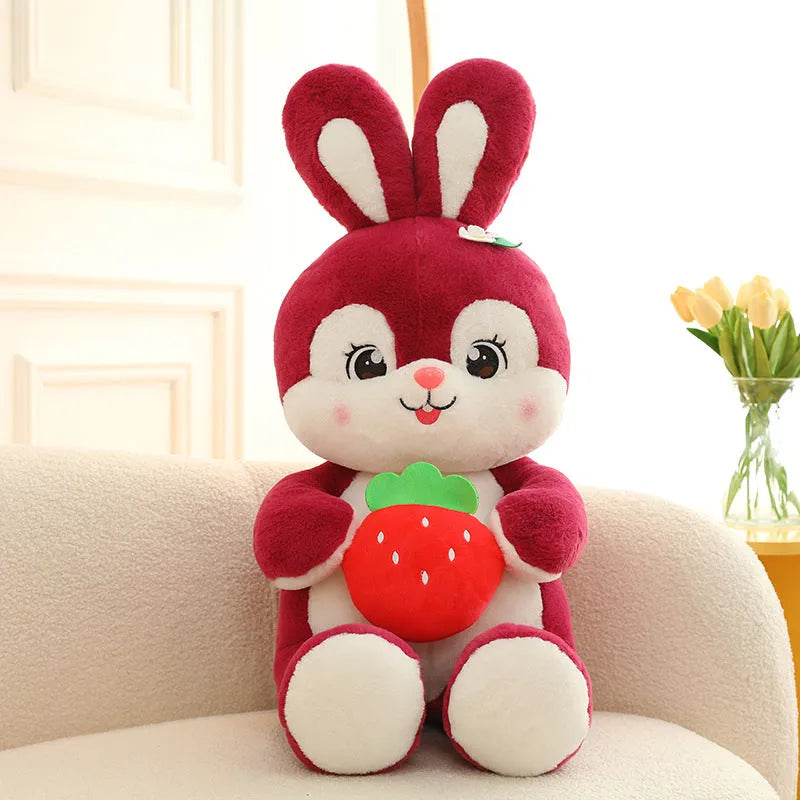 Pink strawberry rabbit plush toy doll pillow with soft furry fabric on white background
