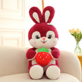 Pink strawberry rabbit plush toy doll pillow with soft furry fabric on white background