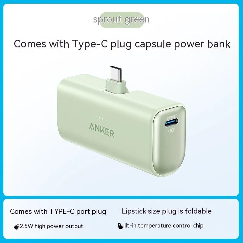 Small capsule-shaped power bank in multiple colours showing USB-C port and compact size.