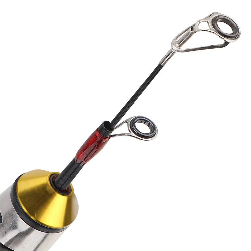 Wood grain ice fishing rod with carbon coating, retracted to 0.6 metres, shown on ice surface