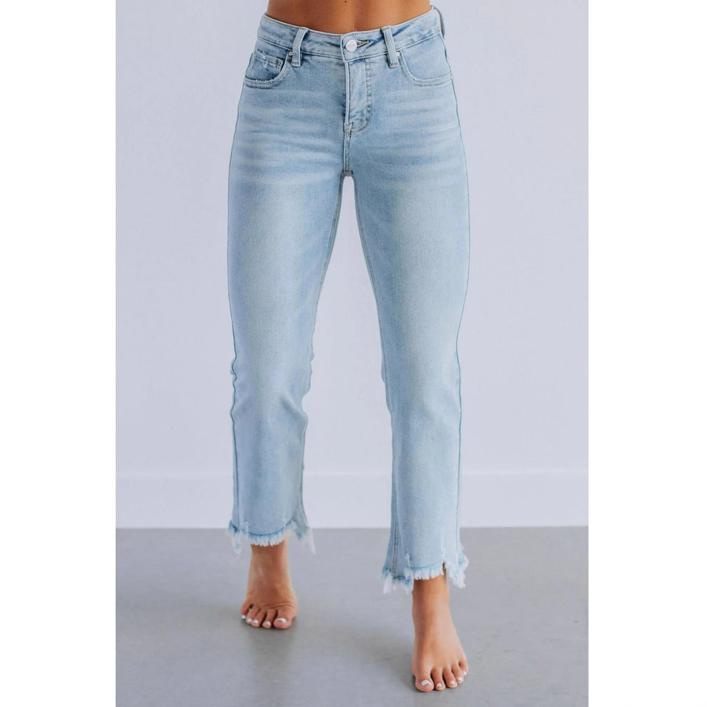 Women's solid colour denim pants with a hand-worn finish in dark blue and light blue.