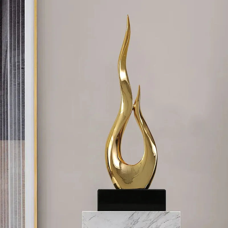 Large modern festival high-rise ornament in resin plastic with metallic gold finish