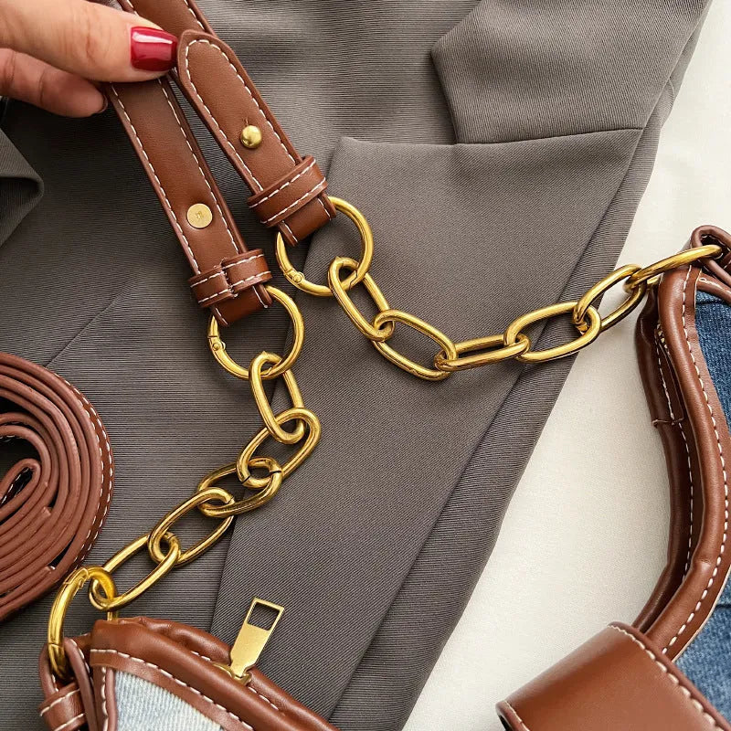 Brown denim women's shoulder bag with diamond mesh and chain detail, bucket shape.