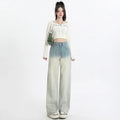 Women's wide-leg straight-cut denim trousers in a gradient blue colour wash.