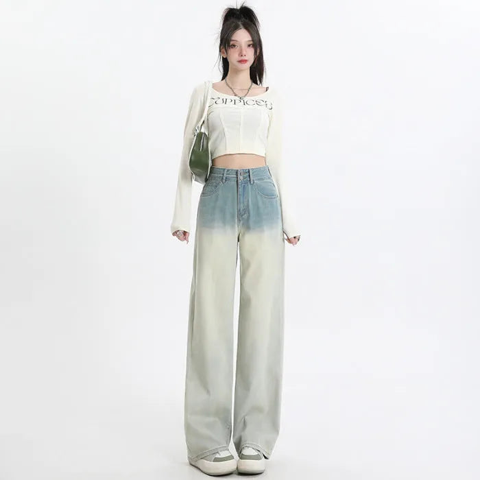 Women's wide-leg straight-cut denim trousers in a gradient blue colour wash.