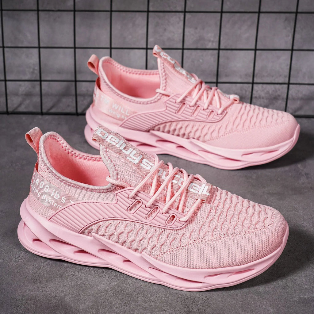 Women's FlyKnit casual shoes in a solid colour with mesh upper and round toe.