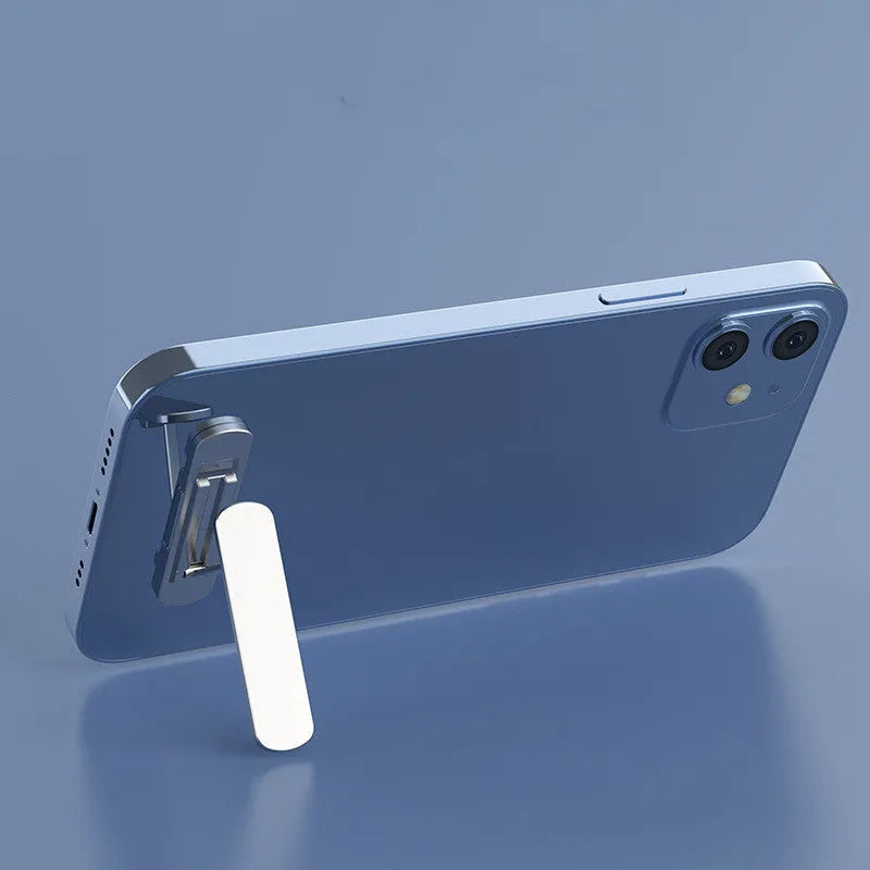 Foldable aluminium phone holder in silver, 55x14x4.5mm, with 360° rotation and 180° extension.