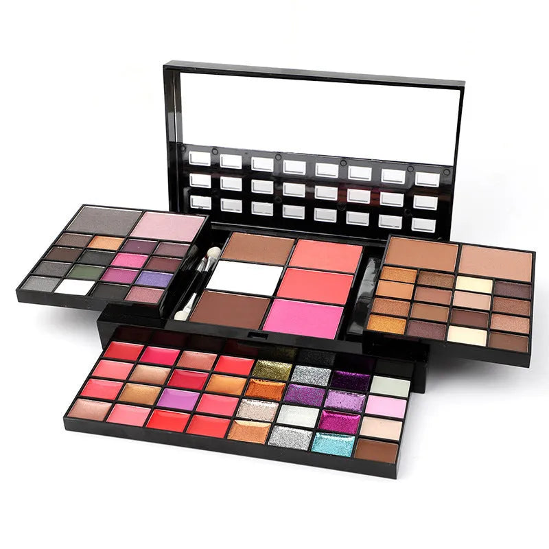 74 colour makeup palette set open to show eyeshadows, lip glosses and brushes in a plastic case with mirror