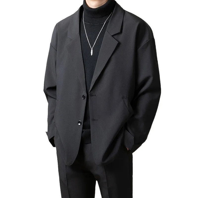 Men's loose fit casual suit jacket in light business style with long sleeves and regular length