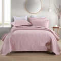 Double-sided pure cotton bed cover three-piece set in a light grey damascus pattern on a bed.