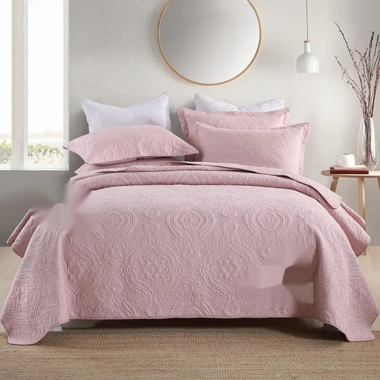 Double-sided pure cotton bed cover three-piece set in a light grey damascus pattern on a bed.