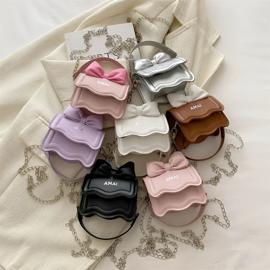 Mini PU crossbody handbag in multiple colours including black, pink, and silver