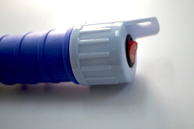 Blue and red manual hand siphon pump for fuel and liquid transfer.
