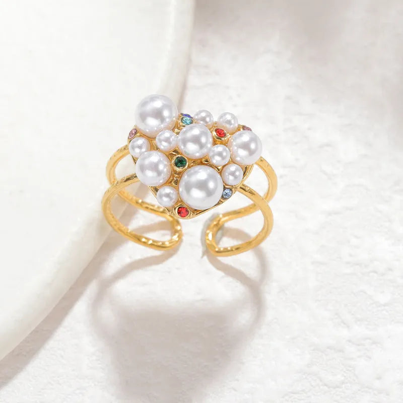 Women's stainless steel open ring with pearl decoration and zircon accents in heart shape