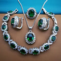 Mixed gem inlaid jewellery set with O-ring chain in black, including ring, necklace, bracelet, and earrings