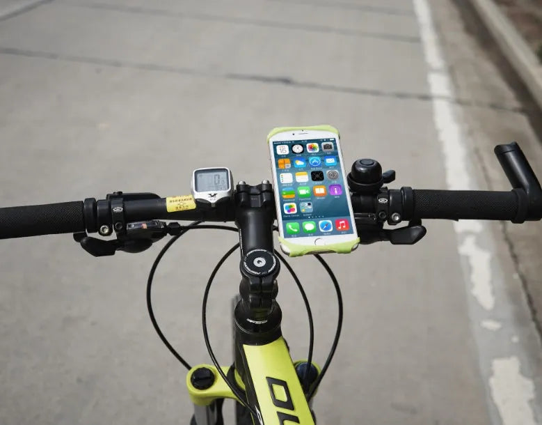 Silicone bicycle phone holder mounted on handlebar with three adjustment holes visible