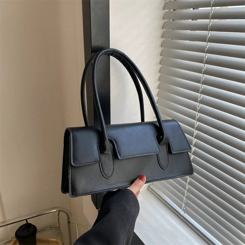 Women's black PU small square shoulder bag with single strap and stitching details