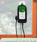 Digital temperature and humidity controller with LCD display showing temperature readings
